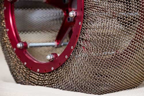 a close-up of a mesh nitinol tire